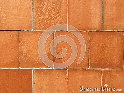 clay tile floor paver blocks red shiny tiles backslash square wall block trim Stock Photo