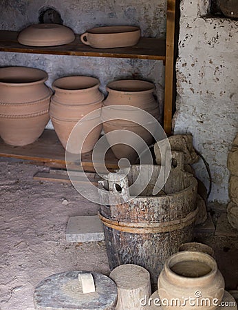 Clay vessels and wooden bowl Stock Photo