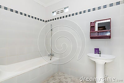 Clean and Cheap hotel bathroom Editorial Stock Photo