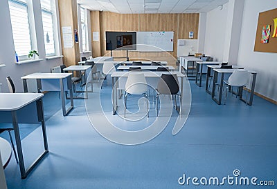 A clean classroom with big windows Stock Photo