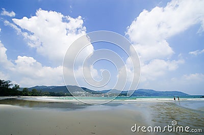 Clean and clear sand beach blue sky Stock Photo