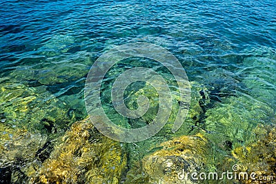 Clean and clear sea water. Paradise rocky shore Stock Photo