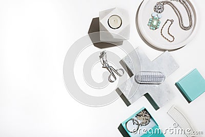 Clean crisp white and aqua flat lay of beauty products Stock Photo