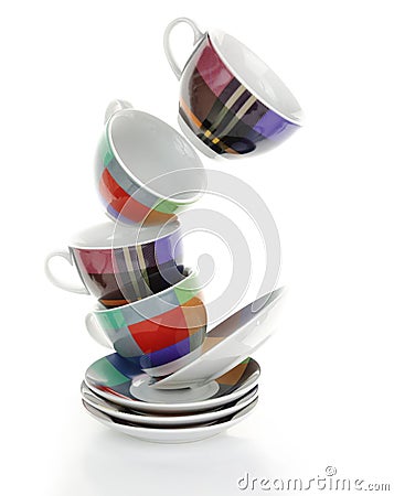 Clean empty colorful plates and cups Stock Photo