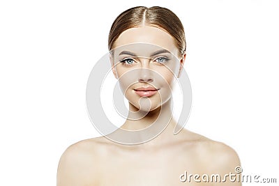 Clean Fresh Skin. Perfect natural young female face. Beautiful model with clear skin. Closeup beauty portrait with nude makeup. Stock Photo