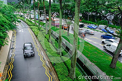 Clean and green atmosphere on street after rain in Singapore Editorial Stock Photo