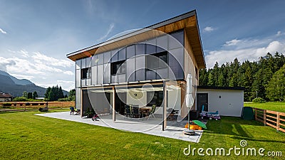 Perspective of sun energy solar sun house with panels on front Stock Photo