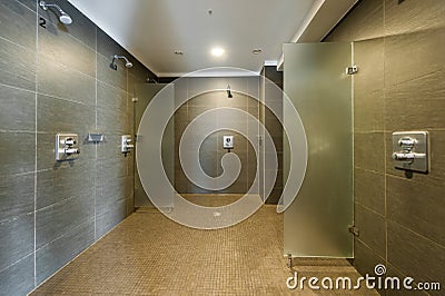 Clean and modern shower room in fitness studio Stock Photo