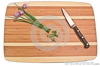 Clean and Natural Wood cutting Board with herbs Stock Photo