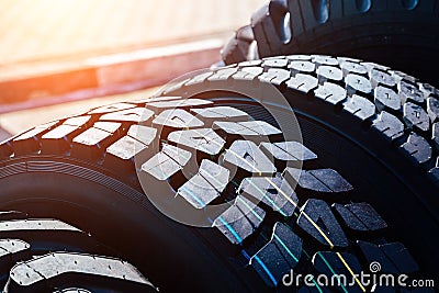 Clean new modern truck tire. Close up view of surface Stock Photo