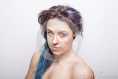 Clean portrait of a thirty year old woman with messy hair Stock Photo