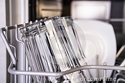 Clean shiny transparent glasses in dishwasher Stock Photo