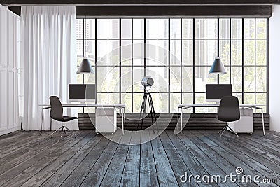 Clean studio office interior with window and city view, hardwood floor, daylight, furniture and equipment. Stock Photo