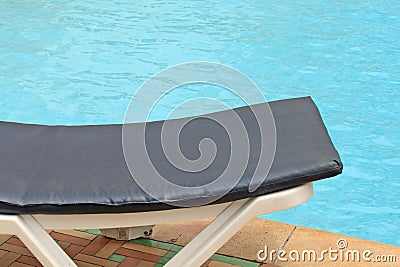 Clean swimming pool and resting chair Stock Photo