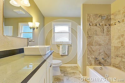 Clean and warm bathroom interior with marble tile Stock Photo