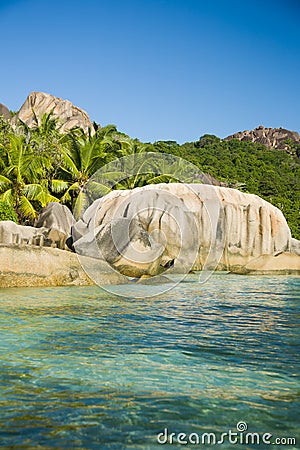 Clean water, natural pools, huge granite rocks of Seychelles. Stock Photo