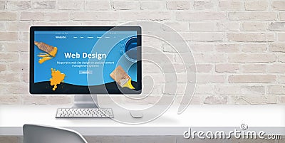 Clean web designer desk with computer display and modern flat design web site teme with web design text Stock Photo