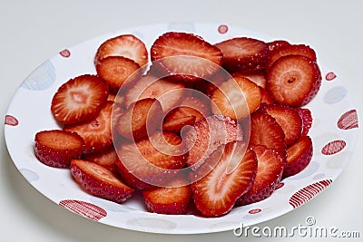cleaned strawberries on a plate Stock Photo