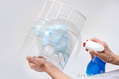 cleaning air conditioner filter Stock Photo
