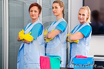 Cleaning brigade working in office Stock Photo