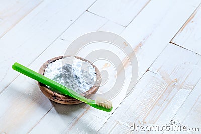 Cleaning and brightening teeth with natural non-toxic baking soda Stock Photo