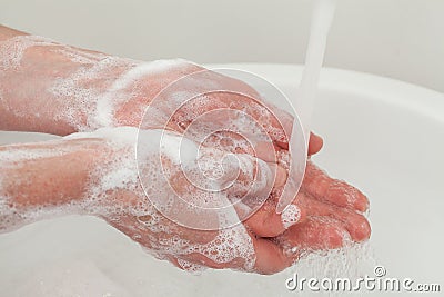 Hands rinsing Stock Photo