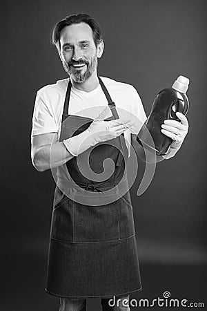 Cleaning day today. Bearded guy cleaning home. Cleanliness and order. Cleaning service and household duty. So dirty. Man Stock Photo