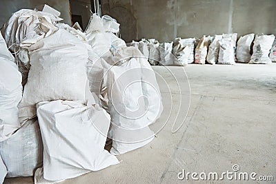 Cleaning debris. Heap of construction waste in bugs in apartment Stock Photo