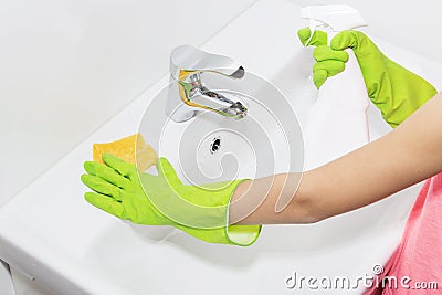 Cleaning the faucet cleaning products. The cleanliness in the house. Stock Photo