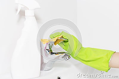 Cleaning the faucet cleaning products. The cleanliness in the house. Stock Photo