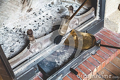 Cleaning fireplace with open tray. Stock Photo