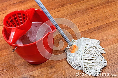 Cleaning of floors by mop Stock Photo