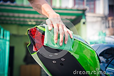 Cleaning motorcycle Stock Photo