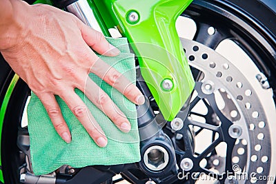 Cleaning motorcycle Stock Photo