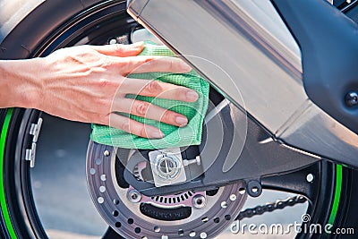 Cleaning motorcycle Stock Photo