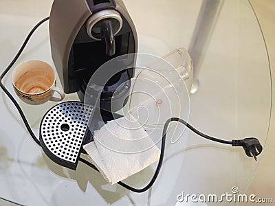 Cleaning old coffee machine Stock Photo