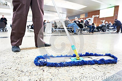 Cleaning public hall floor Stock Photo