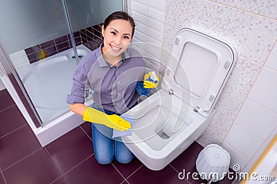 Cleaning in the restroom Stock Photo