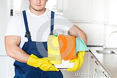 Cleaning service with professional equipment during work. professional kitchenette cleaning, sofa dry cleaning, window Stock Photo