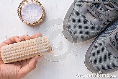 Cleaning shoes,washing the dirty sneakers at home, Stock Photo