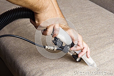 Cleaning sofas Stock Photo