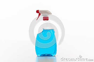 Cleaning spray bottle clear with blue color fluid isolated against white background Stock Photo