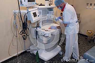 Cleaning staff cleaning hospital rooms Stock Photo