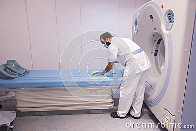 Cleaning staff performing disinfection and hygiene work in hospital facilities Stock Photo