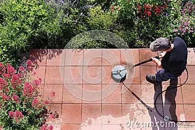 Cleaning stone slabs with the high-pressure cleaner Stock Photo