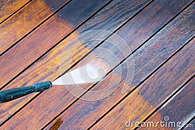 Cleaning terrace with a power washer Stock Photo