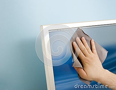 Cleaning a TFT screen Stock Photo