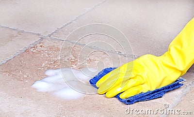 Cleaning tile with cloth Stock Photo