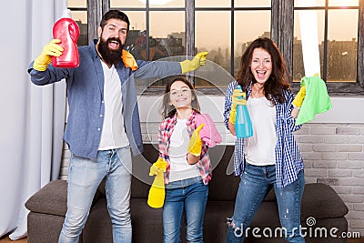 Cleaning together easier and more fun. Family care about cleanliness. Start cleaning. Cleaning day. Family mom dad and Stock Photo