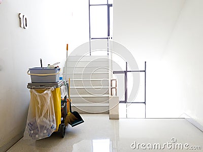 Cleaning tools cart wait for cleaner.Bucket and set of cleaning equipment in the office. janitor service janitorial for your place Stock Photo